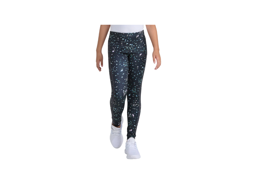 Person wearing black leggings with white speckles on a white background