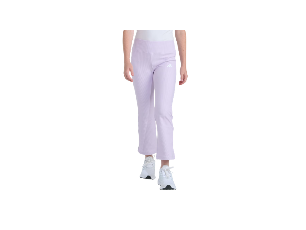 Person wearing light purple pants and white sneakers on a white background