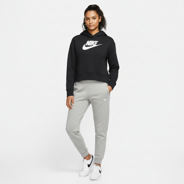 Women wearing a black Nike hoodie and gray pants on a white background
