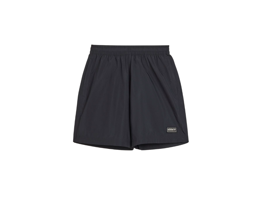 Black shorts with a brand logo on a white background