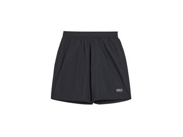 Black shorts with a brand logo on a white background